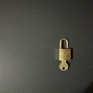 Louis Vuitton Gold Padlock Jewelry